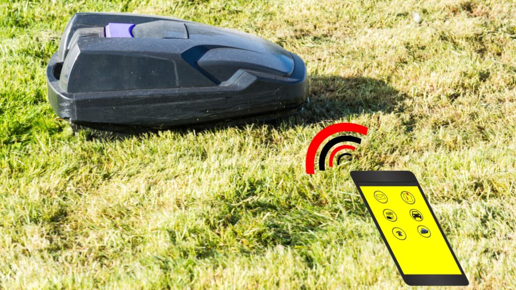 Cortador de grama robô controlado por aplicativo de celular, mostrando o uso de tecnologia inteligente nas ferramentas de jardinagem modernas.